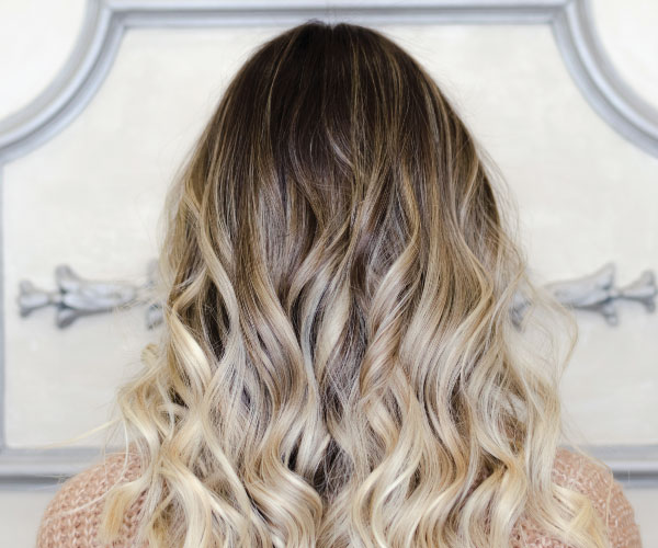 woman with blond hair with balayage treatment